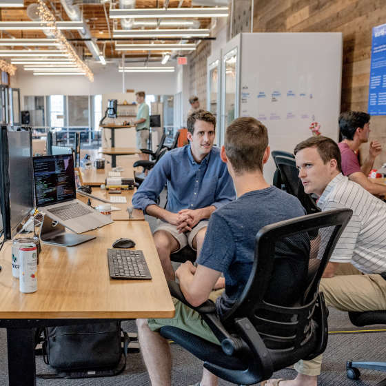 Callytics team collaborating in a modern office environment